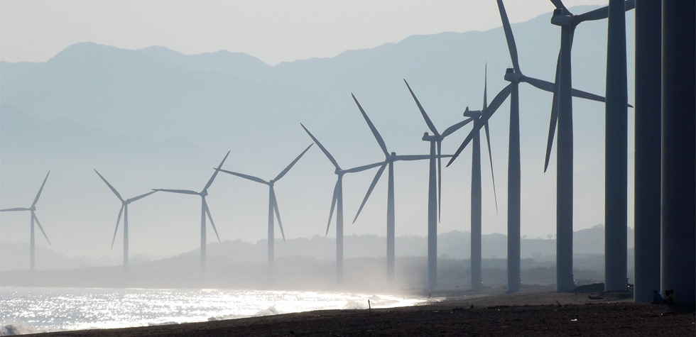 Photo of a wind farm on the coast